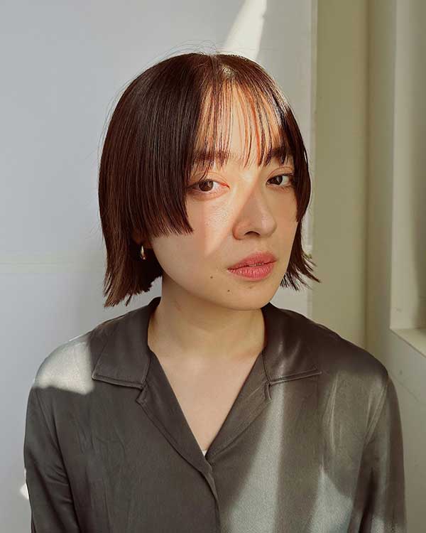 Kurze koreanische Frisur für rundes Gesicht